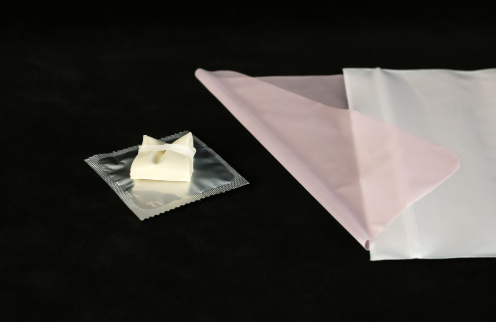 On the left, Beffy brand dental dams, on the right, the slightly silkier ones from ESP.